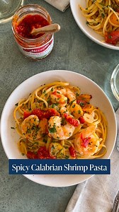Our NEW Calabrian Pepper Sauce adds the extra kick you want in this Spicy Calabrian Shrimp Pasta!🔥 You’re going to want to save this recipe🍝 Yield: 4 servings Prep Time: 10 minutes Total Time: 25 minutes INGREDIENTS 1 lb. large shrimp, peeled and deveined and tails removed 2 tablespoons extra virgin olive oil 4 cloves garlic, sliced 2 tablespoons Mezzetta® Calabrian Pepper Sauce, or to taste ¼ cup white wine 1 cup cherry tomatoes, halved Salt and pepper, to taste 12 ounces linguine pasta, cook