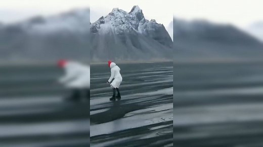 Wind blows through black sand in Iceland to create rare phenomenon known as 'Sand Snakes'
