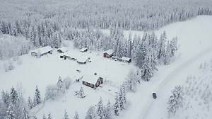 Dog sledding through vast expanses of white is in many ways synonymous with a winter adventure in Swedish Lapland. | Swedish Lapland
