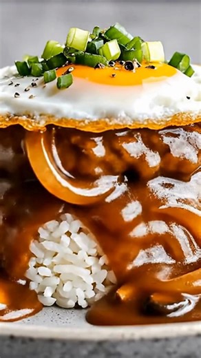 Classic Loco Moco Recipe Ingredients: - 2 cups Calrose rice, rinsed well - Loco Moco burger patties - Beef gravy - Fried eggs - 2 green onions, thinly sliced Loco Moco Burger Patties: - 1 tbsp unsalted butter - 1 lb 80% lean ground beef - 1 large egg - 2 tbsp panko breadcrumbs - 1 tbsp Worcestershire sauce - ½ tsp seasoned salt - ½ tsp onion powder - ¼ tsp ground black pepper Onion and Mushroom Beef Gravy: - 1 tbsp unsalted butter - 8 oz white button or cremini mushrooms, thinly sliced - 1 mediu
