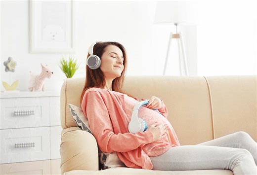 30  Best Pregnancy Songs to Soothe, Relax, and Bond With Baby