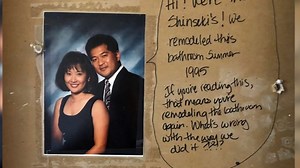Couple finds hidden message in wall
