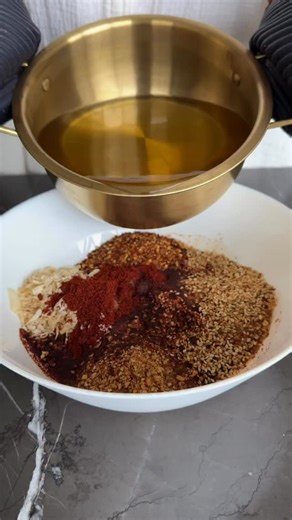 Homemade Chili Crunch🌶️🧄🔥🧅 Makes about 4 x 6-ounce jars (24 ounces total) For links to everything used in the video, comment “links” and I’ll send it to your inbox✨ Ingredients: * ½ cup dried garlic (68g) * ½ cup dried onions (47g) * ½ cup red chili flakes (36g) * ½ cup toasted sesame seeds (46g) * ⅛ cup sugar (26g) * 1 tsp salt (6g) * 1 tbsp paprika (7g) * ¼ cup soy sauce (60ml) * 2½ cups avocado oil (590ml) Instructions: 1. In a large heatproof bowl, combine the dried garlic, dried onions,