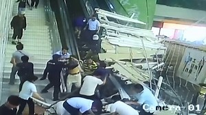 Horrifying moment a roof collapses, leaving multiple tourists injured