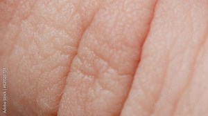 Close-up of man hand skin texture. Macro Detailed human skin, lines on hand palm.