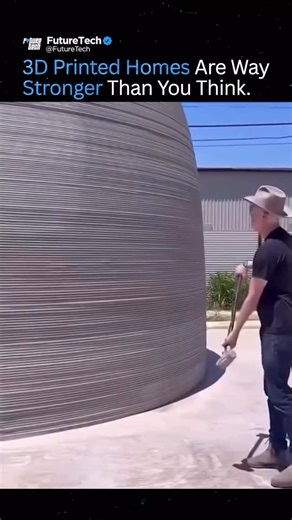 Future Tech on Instagram: "Many people assume 3D-printed homes are weak or just a flashy tech experiment. In reality, they’re often tougher and more durable than traditional construction. In the clip, a 3D-printed wall is struck repeatedly with heavy force—yet it shows no cracks, not even surface damage. That’s because these homes don’t use standard concrete. Large-scale printers rely on specially engineered concrete mixes designed for high strength, rapid curing, and long-term performance. The