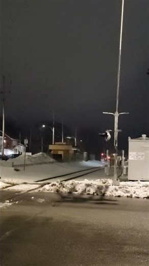 CN defect Detector Activating as Via rail 15 passes Rue des Braves / Rimouski Qc.