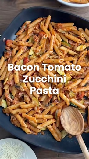 Delicious speedy Mushroom, Bacon, Tomato and Zucchini Pasta - a simple but delicious pasta recipe that the whole family will love. Serves 4 | Calories: 407 | Protein: 17g Grab these ingredients to make: 1 tablespoon of extra virgin olive oil 4 Slices of Lean Smoked Bacon, chopped 1 onion, finely diced 8 mushrooms, chopped 2 garlic cloves, minced 8 grape or cherry tomatoes, quartered 1.25 cup (300mlml) of chicken stock 1 cup (240g) of passata (or use canned crushed tomatoes) 2 tablespoon of tomat