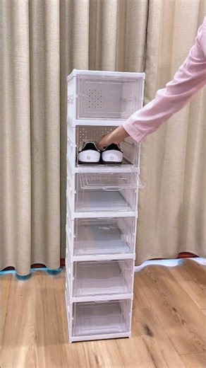 Unboxing a foldable shoe storage cabinet.