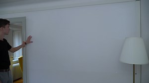 I made a completely free (and ad-free) website for placing picture frames on your wall :)