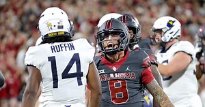 WATCH: Brawl breaks out in West Virginia vs Oklahoma