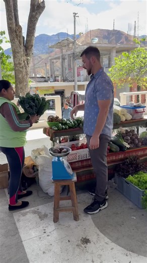 Purchasing Kale for Raw Food Retreat at Market