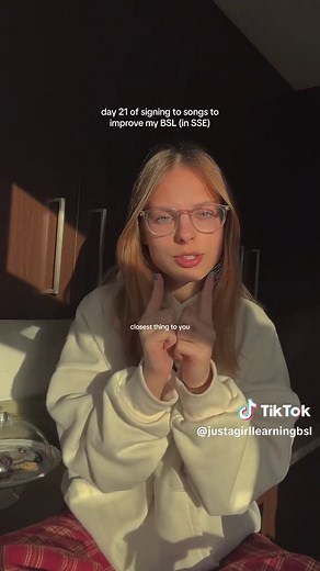 Learning British Sign Language Through Songs