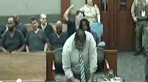 Moment prisoner brawls with inmate in SAME court as ‘flying felon’ attack