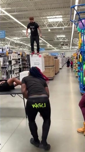 Professional wrestlers are showing off some stunts in Walmart!