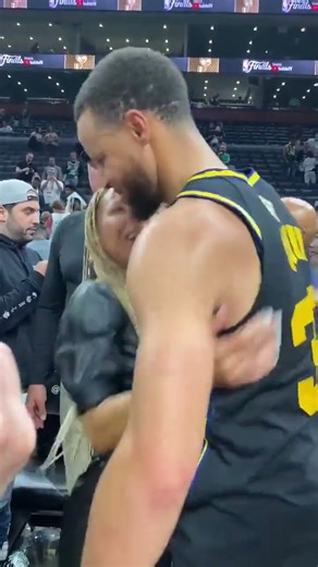 Stephen Curry hugs his mom after his 43 point performance in Game 4!