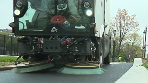 DC's new bike lane street sweeper cleans up debris around city