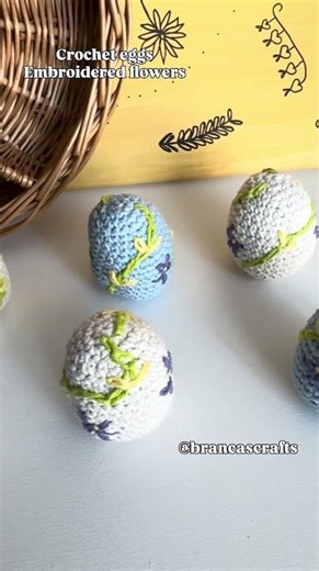 Handmade crochet eggs for Easter with embroidered flowers