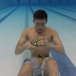 Watch This Kid Solve 3 Rubik's Cubes in 1 Minute—Underwater! (Because It Wasn't Hard Enough Already)