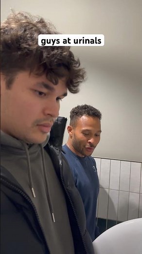Guys at urinals