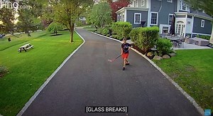 Oops! A kid breaks his home window playing hockey