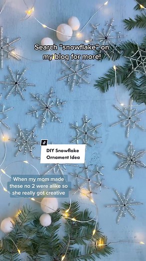 How to make DIY beaded snowflake ornaments. My mom used to make these handmade ornaments for sale and no two were ever alike! Once you get the basic technique, you can get creative and design your own snowflake shapes. They’re an easy DIY Christmas tree ornament idea - but they’re also super cute and wintry and you can use them on garland and wreaths all winter long - they’re not just a pretty Christmas craft project! I’m sharing lots more ornament tree DIY tutorials, DIY Christmas decorations c