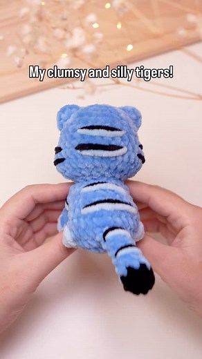 My new crochet friends - silly and clumsy blue tigers in all different shapes! His head is just too cute, so I wanted to crochet every body type to see which suits him best. Bobble Derpy, Chubby Derpy, Sitting Derpy, or Snuggler Derpy, which one is your favorite? #amigurumi #crochetaddict #amigurumipattern #häkeln #plushies #amigurumis #ganchillo | Green Frog Crochet