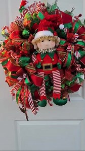 “Santa sent one of his elves to decorate your door! 🎄✨ This playful elf wreath is bursting with # Christmas cheer, candy canes, and holiday magic! #ElfWreath #HolidayDecor #FrontDoorDecor #ChristmasDecor #HandmadeWreath #ChristmasElf | Joey's Charming Creations
