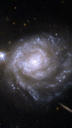 SPECTACULAR GALAXY DUO CAPTURED BY THE HUBBLE SPACE TELESCOPE & CHANDRA X-RAY OBSERVATORY #shorts