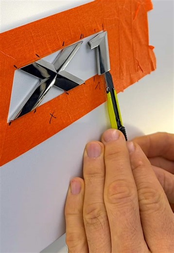 BMW Emblem Template Hack (Remove Reapply Perfectly) 🚗🛠️✨ Want a factory-clean look after a color change wrap, repaint, or dechrome? This BMW X1 trick lets you remove the emblem safely, make a perfect placement template, and stick it back exactly where it belongs—no guessing, no crooked badges. It’s 100% reversible, paint-safe, and uses basic tools, so you can do this at home this weekend. ✅🧼 Clean and degrease the area ✅ Cut the emblem off using fishing line (no scratches) ✅📏 Build a painter