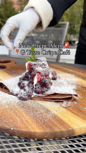 G Taste Crêpe Café on Instagram: "Indulge in the rich flavors of our new G Crêpe! A cocoa-infused crêpe filled with Nutella, topped with a scoop of ice cream, drizzled with our signature house-mixed berry sauce, and dusted with powdered sugar. A perfect treat for your sweet cravings! 🤤❤️"