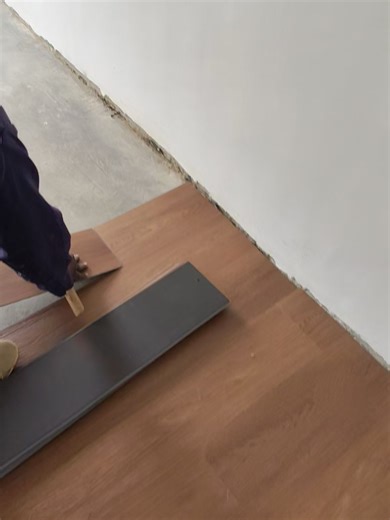 SPC Flooring installation in progress. Planks aligned precisely and click locked tight to create a seamless modern floor with clean straight lines. The strong interlocking system ensures zero visible joints and prevents water seepage for long term durability. SPC Flooring specs: • 5.5mm total thickness • 4mm SPC rigid core • 1.5mm EVA underlay • Waterproof and termite resistant • Scratch resistant wear layer • Click lock system • 2.19m² coverage per box Price: KSh 1,964 per m² KSh 4,300 per box 