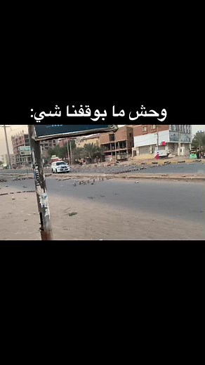 White SUV Navigates Urban Streets with Care