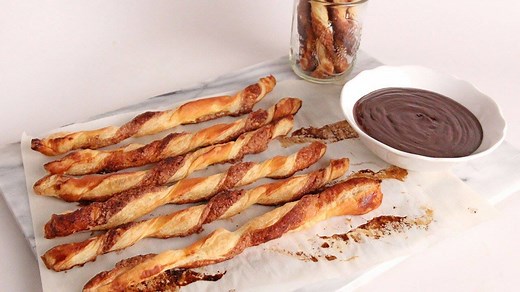 Baked Churro Twists with Chocolate Sauce Written Recipe >> http://www.laurainthekitchen.com/recipes/baked-churro-twist-with-chocolate-sauce/ | Laura in the Kitchen