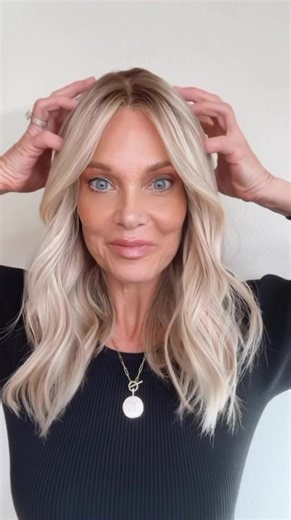 Greer is a glue-less, ear-to-ear lace premium, lace-top human hair wig. Custom colored in a cool neutral beige blonde with dimensional highlights and a medium neutral brown root melt with a natural smudge effect. This human hair lace top wig comes double lined with a removable lace liner, to help disguise any bio hair and knots. Lightly bleached knots for the most realistic hairline. Ear tabs and removable presure clips inside cap. Color: Neutral Blonde Lightly bleached knots 115-120% density Do