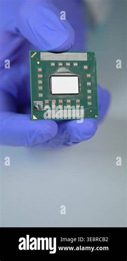 AMD CPU Central Processing Unit of the computer in the hand of engineer. Concept of AI boom triggered shortage of CPUs, components for data centers: Toronto, Ontario, Canada - March 24, 2026 Stock Video Footage - Alamy