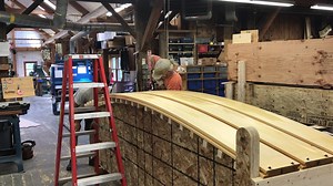 First you steam it, then you bend it! Alaskan yellow cedar being shaped to a curve in the woodworking shop. | Bensonwood