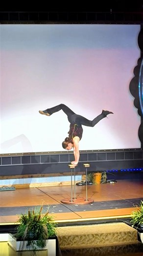 Upside Down… She Spins Herself Using Only Her Hands 😳