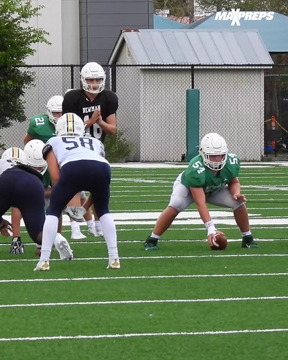 MaxPreps - Center Heid Manning snaps ball to brother and...