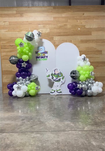 two infinity & beyond 💜💚🤍 #twoinfinityandbeyond #buzzlightyear #balloongarland #secondbirthday #toystory
