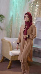 This Caramel embroidered kurti with burgundy velvet trims and bronze buttons. . .. will be your pick for the 1st day at work after Eid. Make each festive day special with Tahoor. | Tahoor