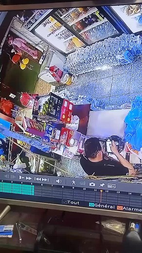 Surveillance Footage of Convenience Store Interaction