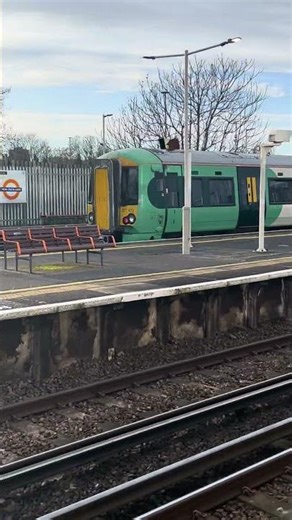 Southern Class 377 Electrostar train speeds through New Cross Gate heading towards London Bridge