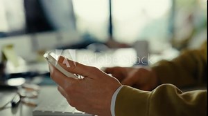 Woman using digital digipass authenticator to sign in on online bank at home