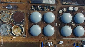 Process of building plant for sustainable production of biofuel. Bio gas factory. Modern plant. Aerial view on the modern biofuel factory. View from above.