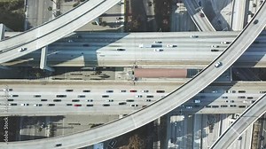 Aerial downtown Los Angeles. Cars traffic on freeway roads in center LA. Metro trains station on highway. urban life modern city in California, America. Drone 4k.
