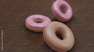 3D rendering of 3 donuts with falling and falling over
