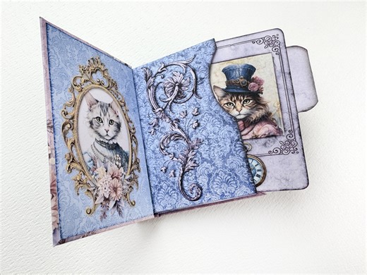 We already have a "Gentleman Cats" Mini Specimen Album project, and now there's also a "Lady Cats" version. I teach you completely how to make it, and you get all the printables you need for free, right here: https://youtu.be/KyGayIwd61I (If the link doesn't work for you > go outside of Facebook > go to the VectoriaDesigns YouTube channel and browse for "Celebration Week" in our channel. | VectoriaDesigns