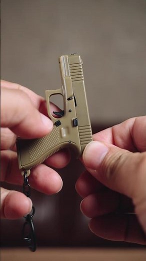 Interesting Glock Gun KeyChain (Miniature) with tactical features