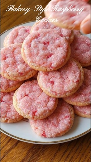 Bakery-Style Raspberry Cookies That Melt in Your Mouth These Raspberry Cookies are soft, thick, and bursting with real berry flavor in every bite. The centers stay tender and slightly gooey, while the edges bake up just lightly golden—pure bakery magic at home. They’re the kind of pink, sugar-dusted treat everyone reaches for when cozy baking moods hit and sweet cravings take over. Save this recipe, share it with a fellow cookie lover, and don’t forget to tag the friend who always steals the las